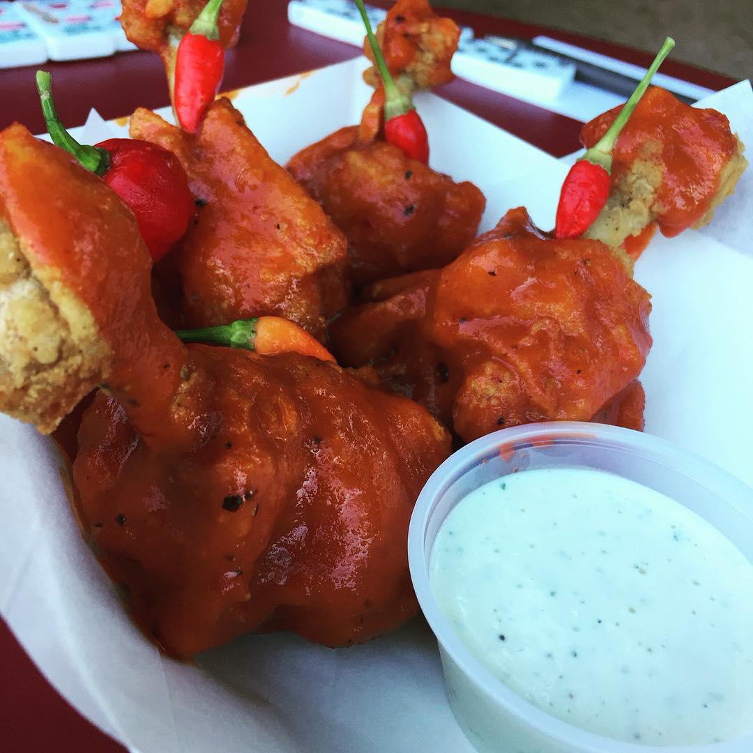 Creative chicken wing sauces Austin - Holy Schnikes hot sauce wings