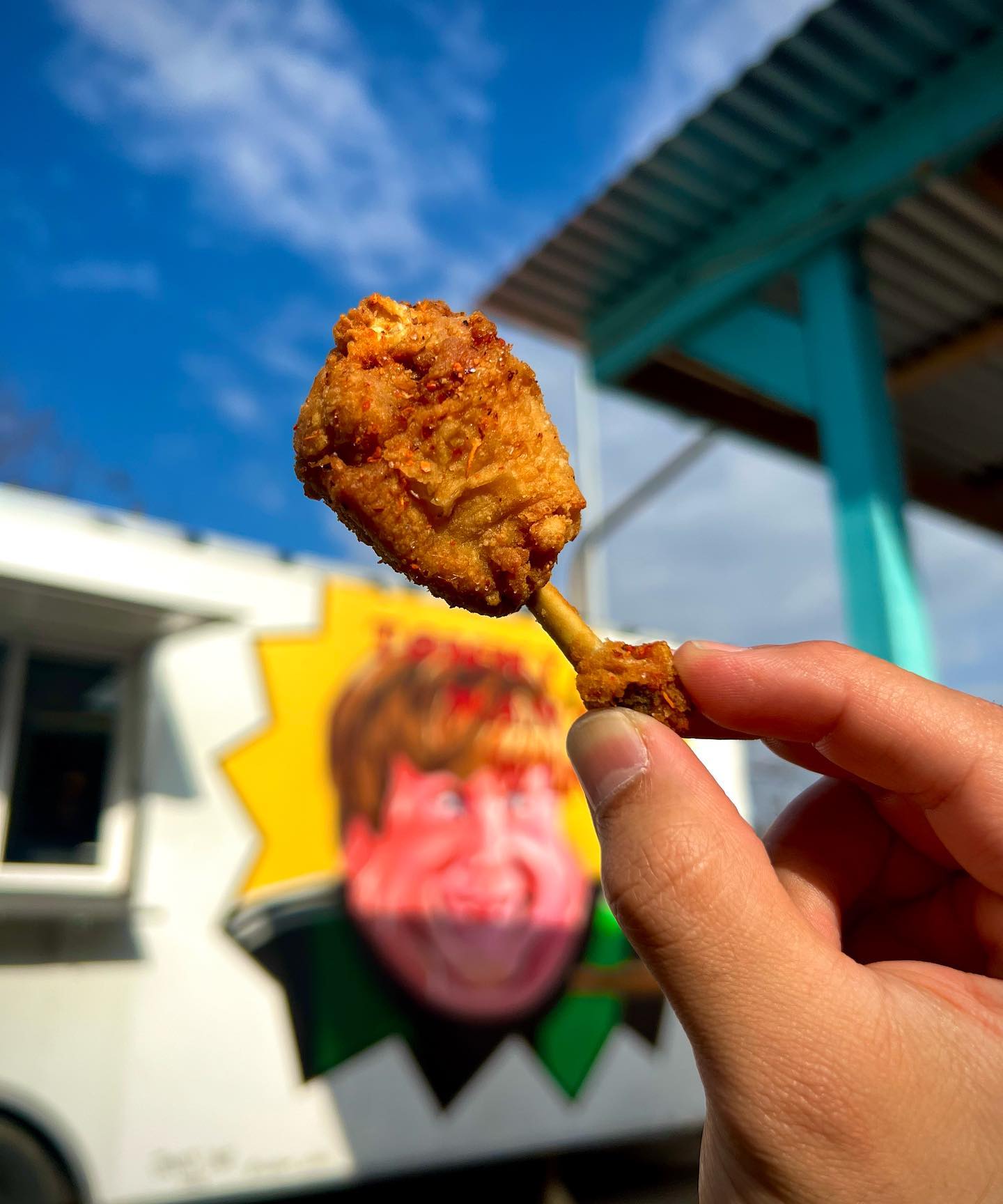 Close-up of Tommy Want Wingy lollipop wings showing the French-cut technique